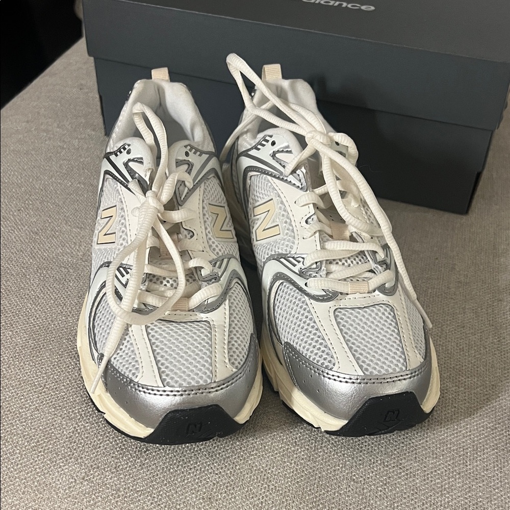 New Balance Silver and White Athletic Shoes